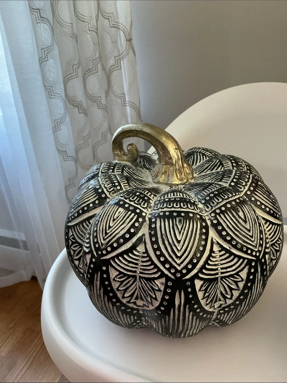 Pumpkins , featuring intricate black-and-white pattern metallic  stems.